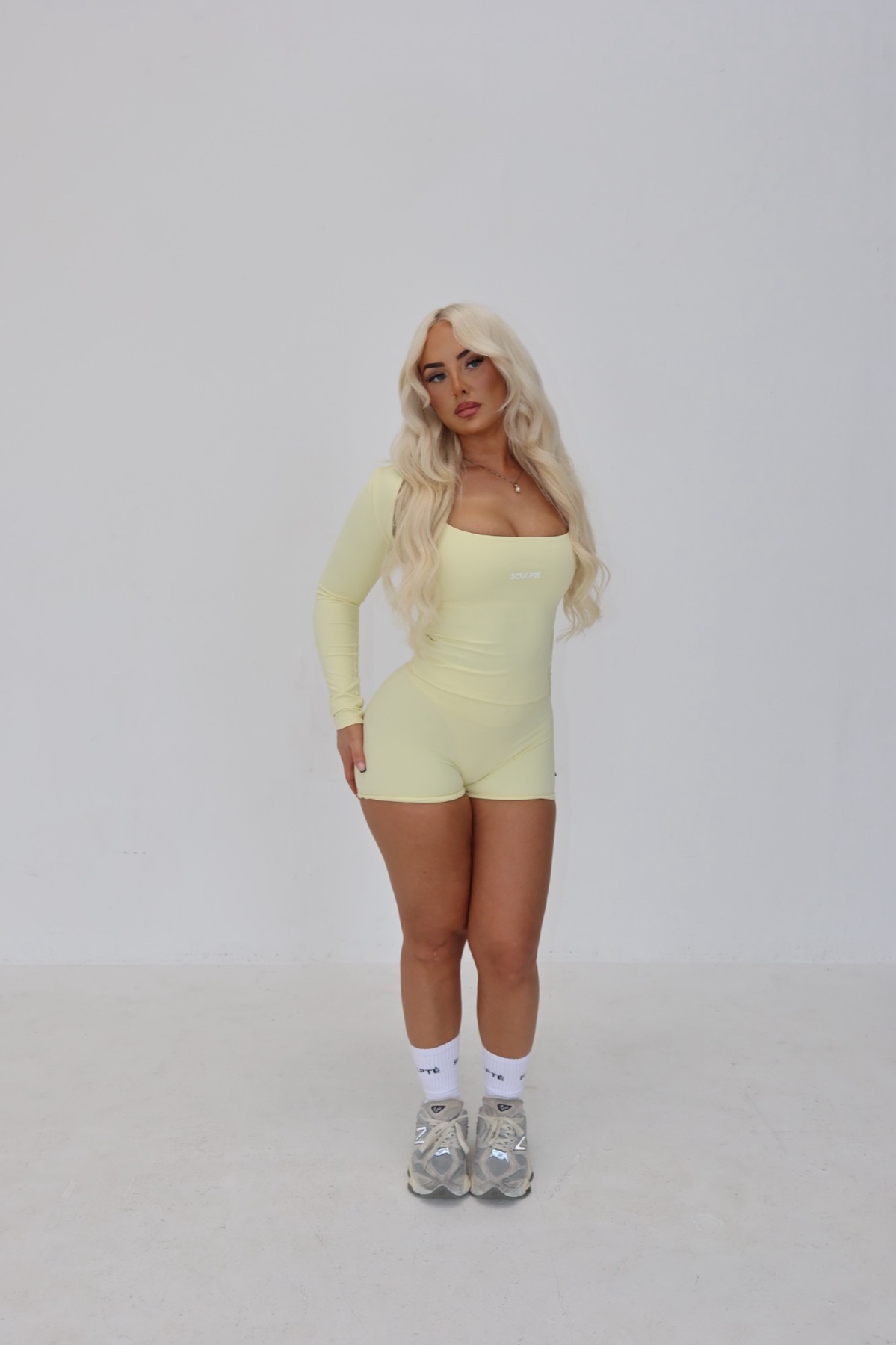 Jessica in a pale yellow training set